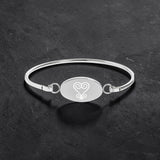 Symbols of Legacy Bangle — Sankofa